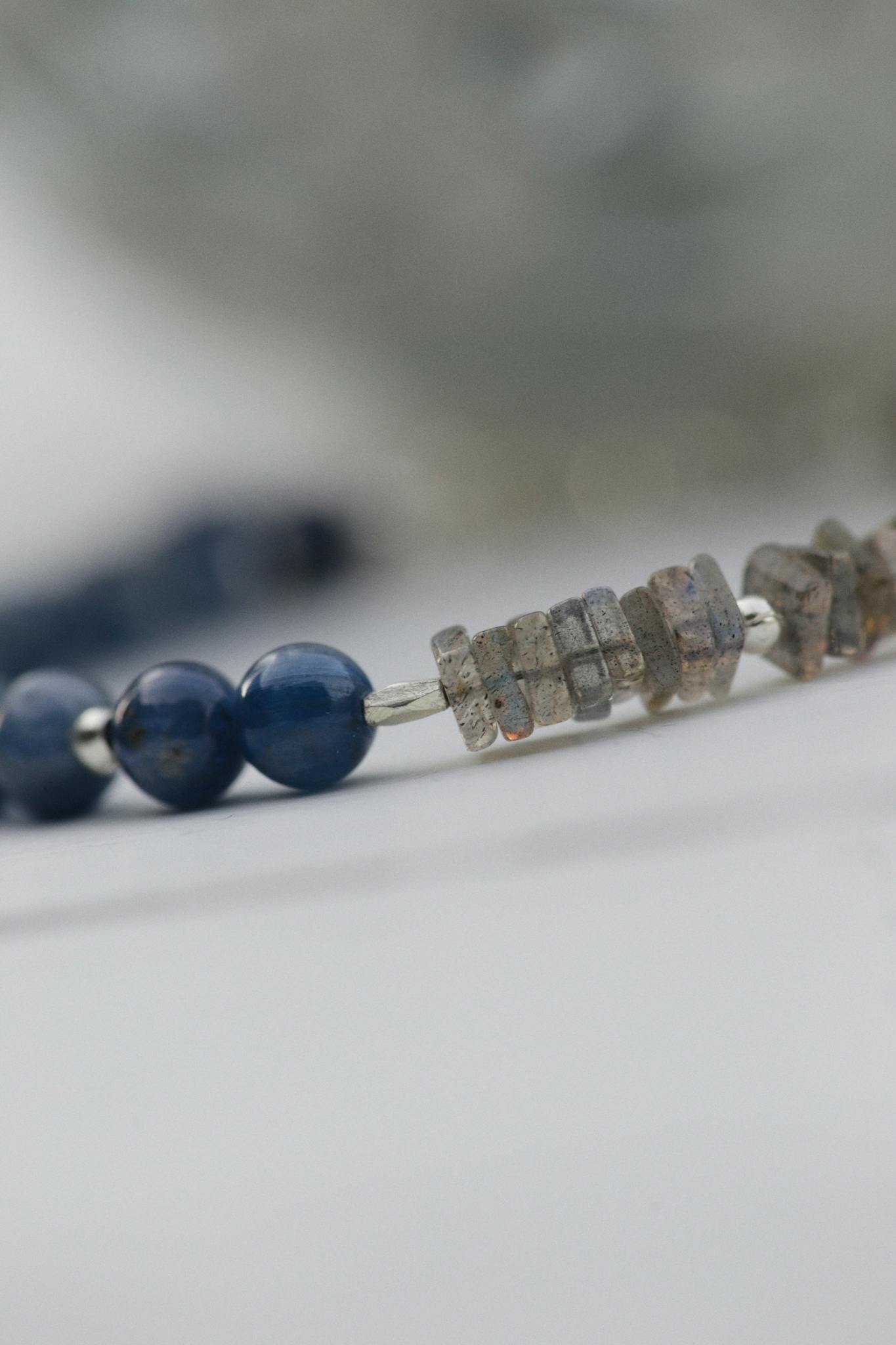 Elegant close-up of a handmade beaded bracelet showcasing its intricate design.